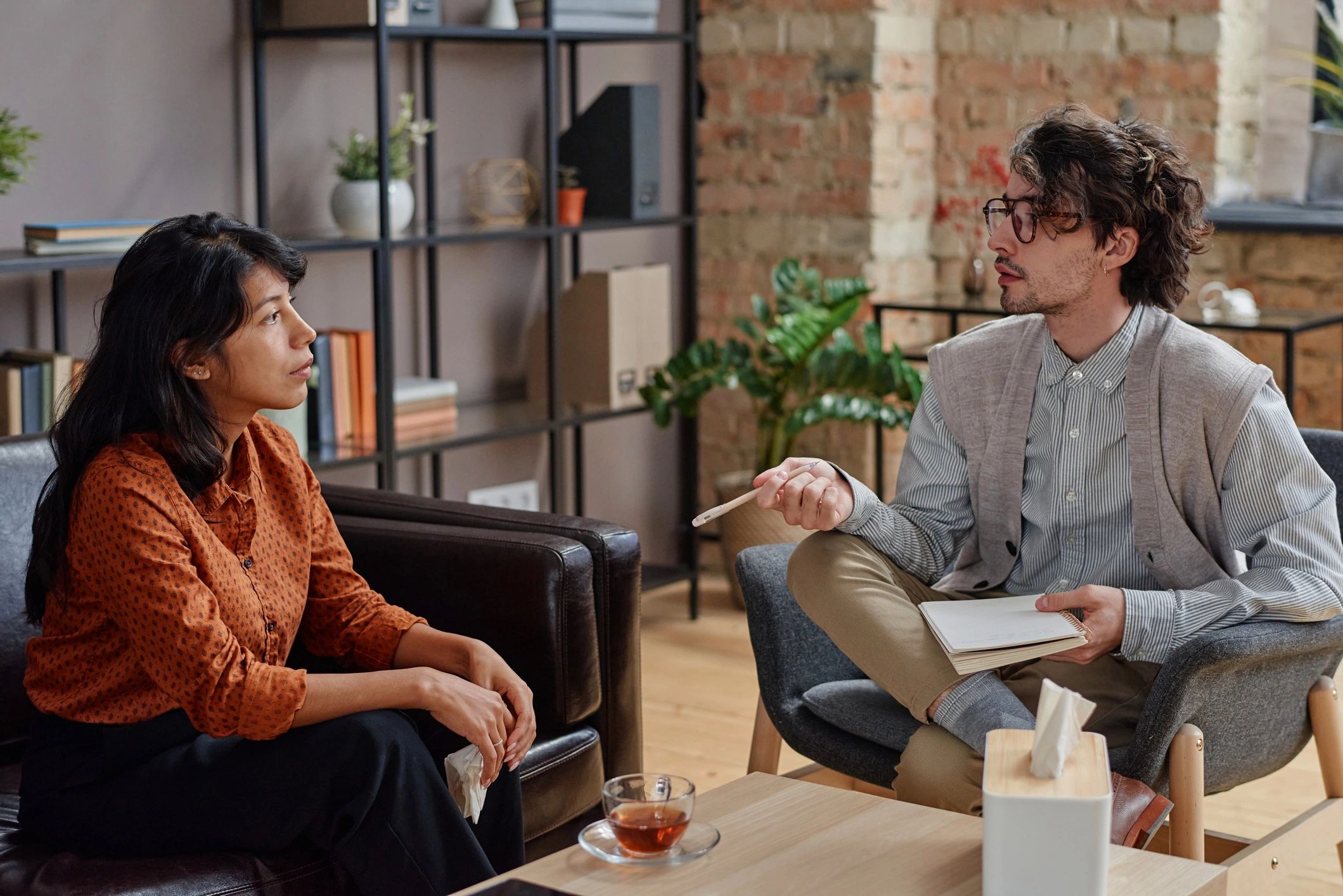 Therapist meeting with a client during a counseling session