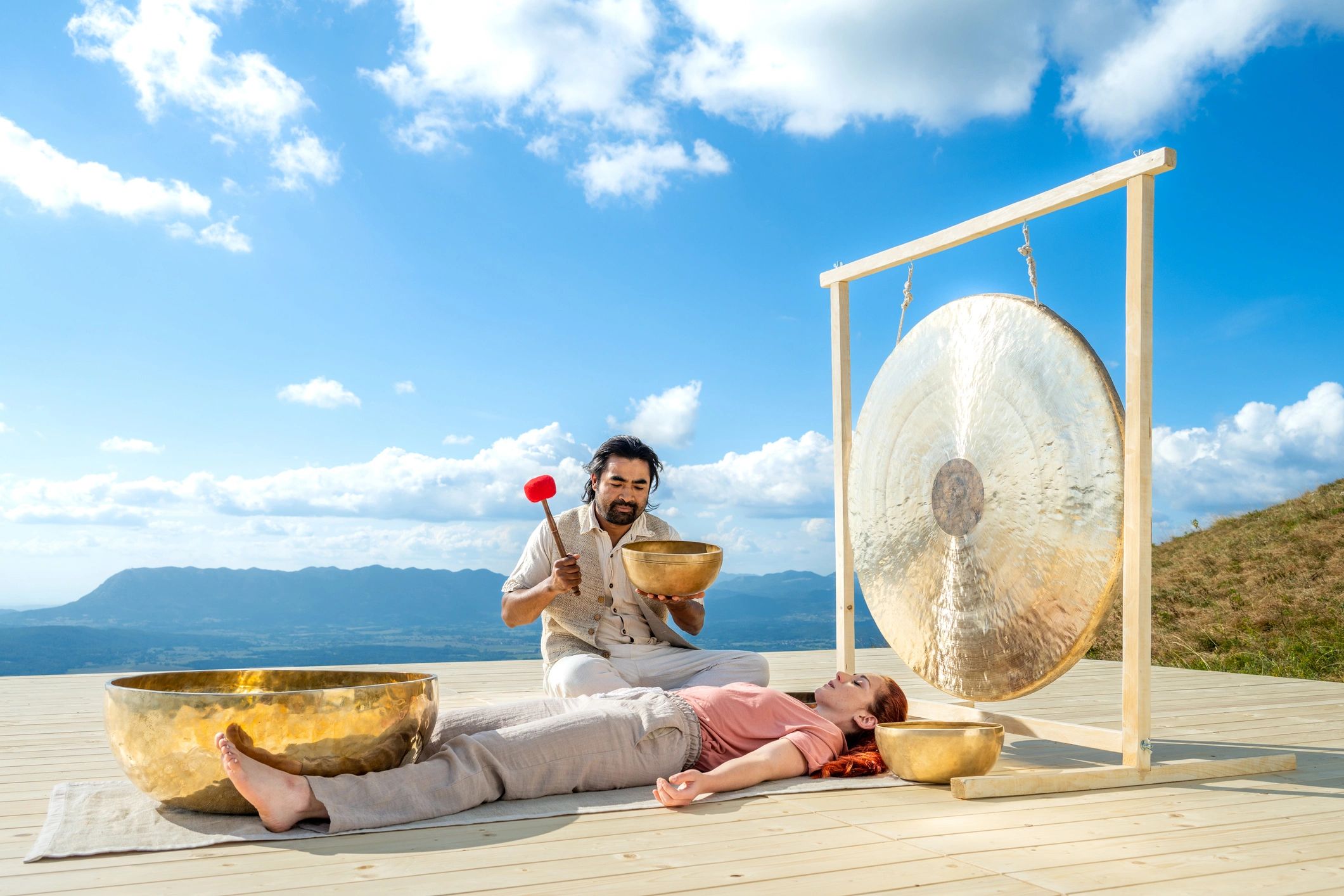 Meditation-based wellness therapy session with sound instrument