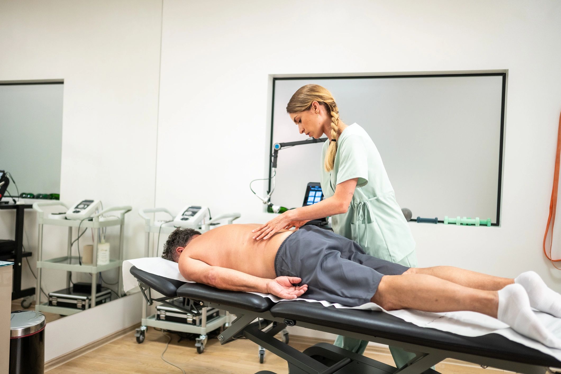 Therapist providing supportive wellness treatment